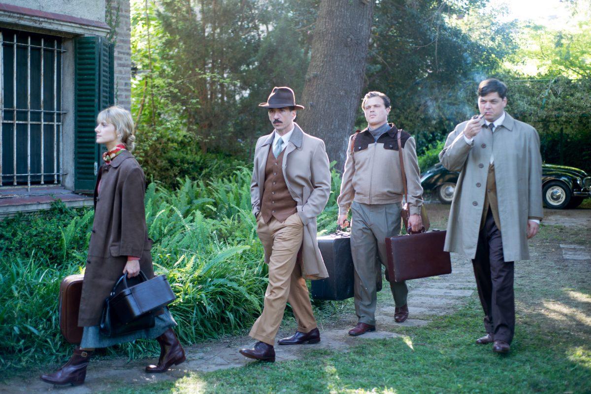 (L–R) Hanna Elian (Mélanie Laurent), Zvi Aharoni (Michael Aronov), Moshe Tabor (Greg Hill), and Ephraim Ilian (Ohad Knoller) as Mossad agents arriving in Argentina, in “Operation Finale.” (Valeria Florini/Metro Goldwyn Mayer Pictures)