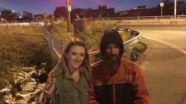 Kate McClure and John Bobbitt stand near the spot by I-95 where they said he helped her when she ran out of gas in a story later exposed as fabricated in court. (GoFundMe)