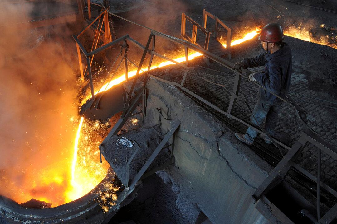 China Data Shows Pressure Building on Economy Despite Output Surprise