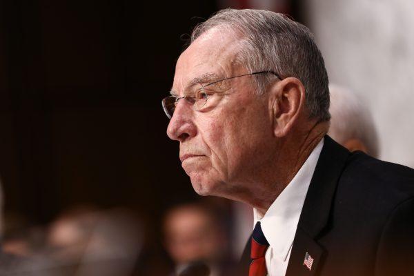 Sen. Chuck Grassley (R-Iowa) listens as Judge Brett Kavanaugh testifies before the Senate Judiciary Committee during the first day of his confirmation hearing to serve as an Associate Justice on the U.S. Supreme Court at the Capitol in Washington on Sept. 4, 2018. (Samira Bouaou/The Epoch Times)