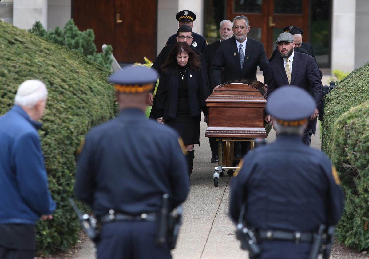 Pittsburgh Synagogue Shooting Suspect Faces New Charges as Funerals Continue