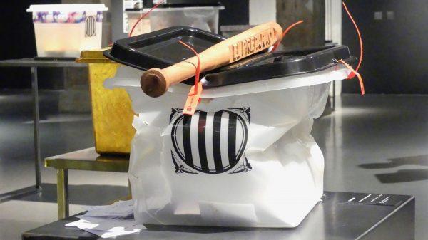 A ballot box smashed by a baton to symbolize police confrontation against pro-independence Catalans taking part in the Oct. 1, 2017 referendum, at an exhibition in Barcelona, Spain, on Oct. 3, 2018. (Anna Llado/Special to The Epoch Times)