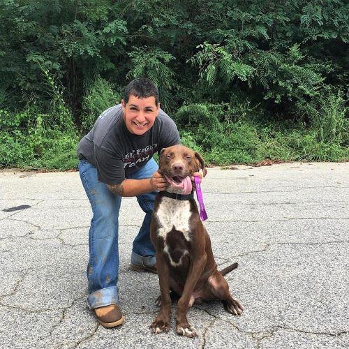 Grace Hamlin, of Atlanta, Georgia, assists less fortunate children in showing kindness by having them work alongside her to help neglected dogs in the neighborhood. (Courtesy of W-Underdogs, Inc.)