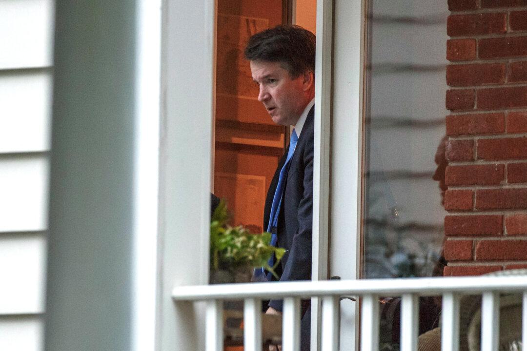 Kavanaugh Takes Active Role During Arguments on First Day on Supreme Court