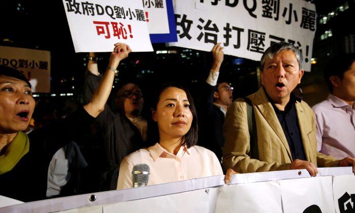 Activists Protest as Hong Kong Disqualifies Pro-Democracy Candidate