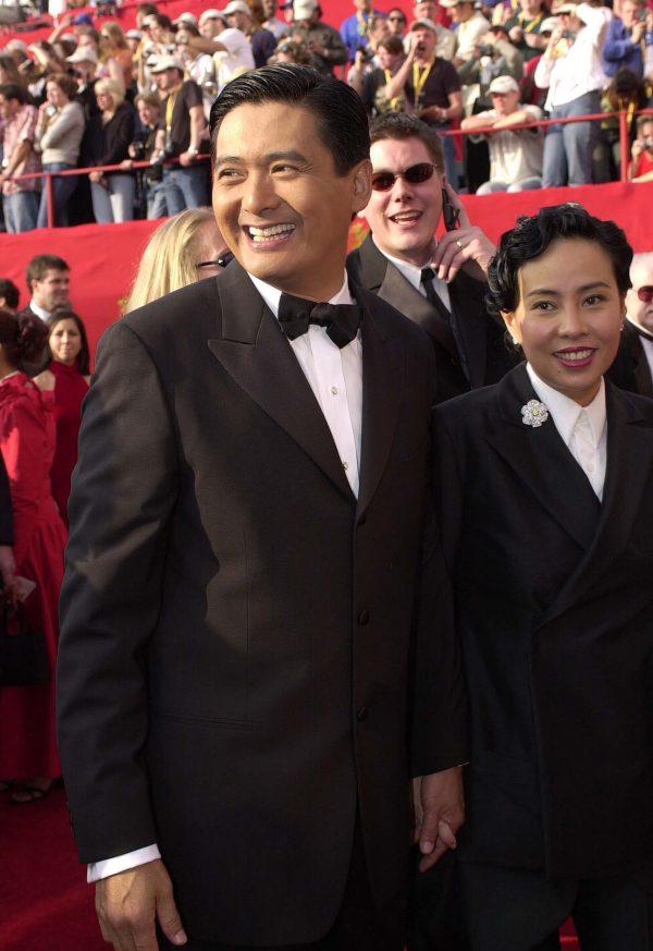 Actor Chow Yun Fat (L) with his wife Jasmine Tan at the 73rd Annual Academy Awards in Los Angeles, on March 25, 2001. (Scott Nelson/AFP/Getty Images)