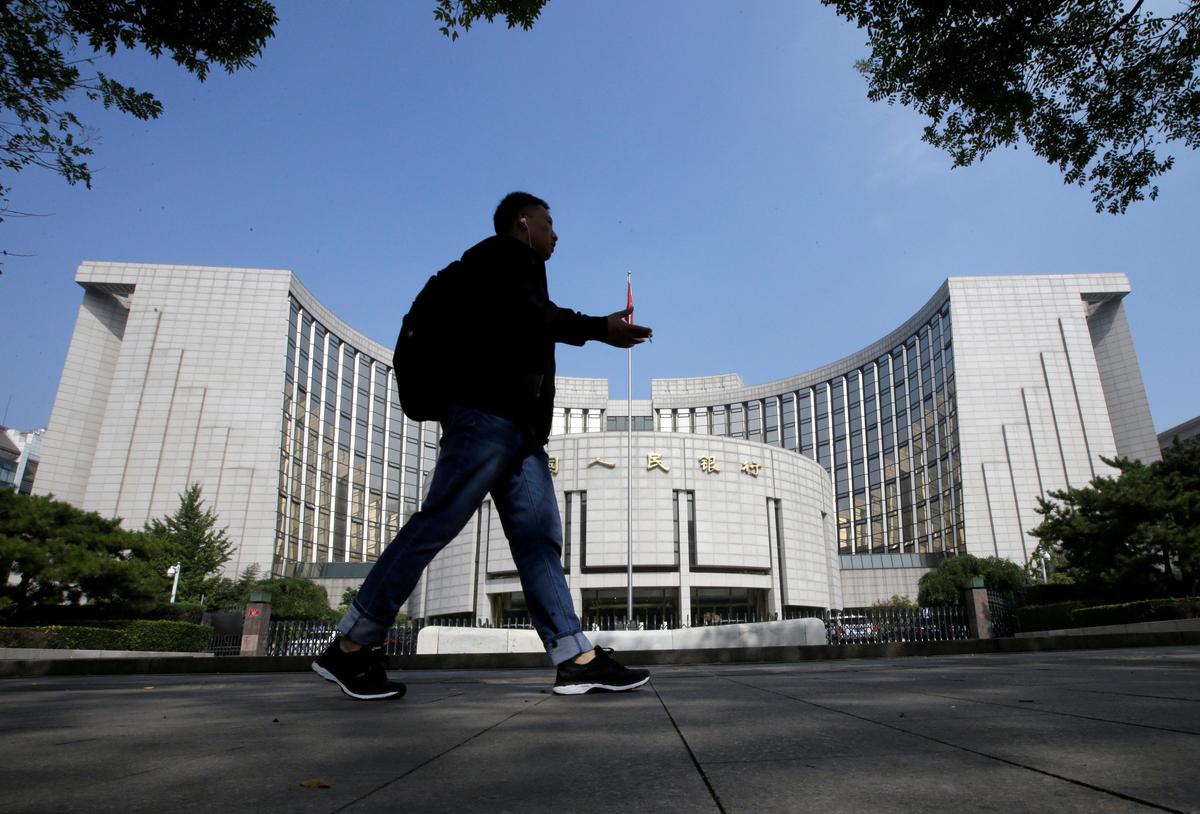 China Loosens Lending Restrictions, Turns on Debt Spigot