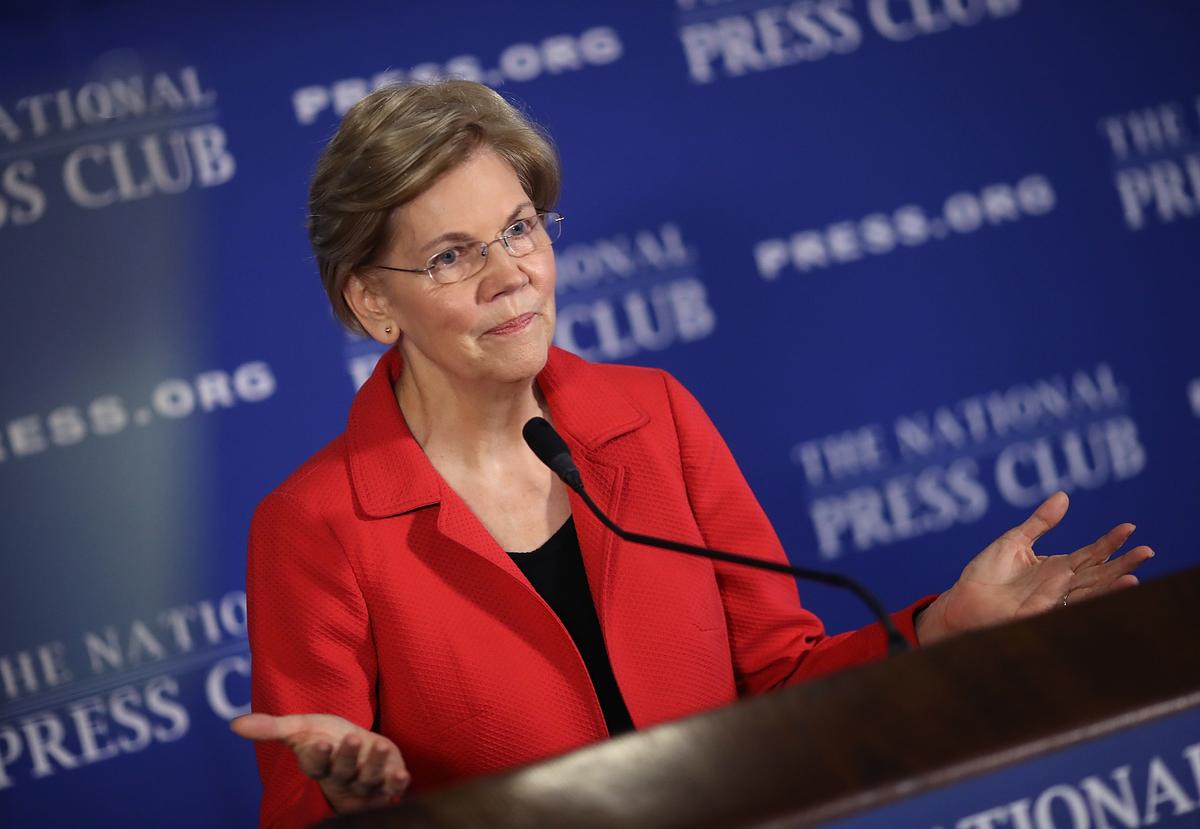 Warren Accuses Police Officer Cleared by Obama’s DOJ of Murdering Michael Brown