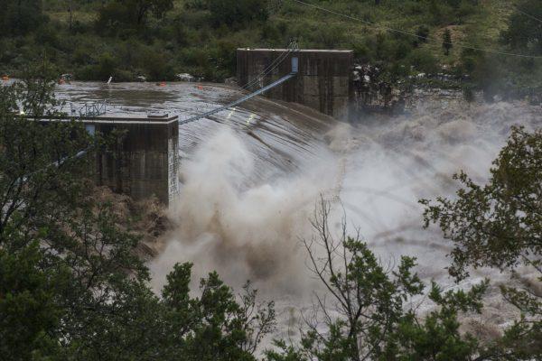 Water from the Colorado River pours over the Max Starcke Dam in Marble Falls, Texas, on Oct. 16, 2018. (Amanda Voisard/Austin American-Statesman/AP)