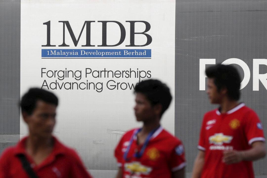US Charges Financier, Former Goldman Bankers for 1MDB