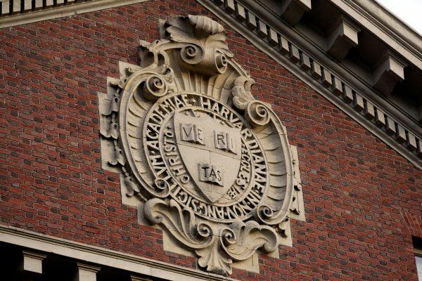 A seal hangs over a building at Harvard University in Cambridge, Mass., on Nov. 16, 2012. (Jessica Rinaldi//File Photo/Reuters)