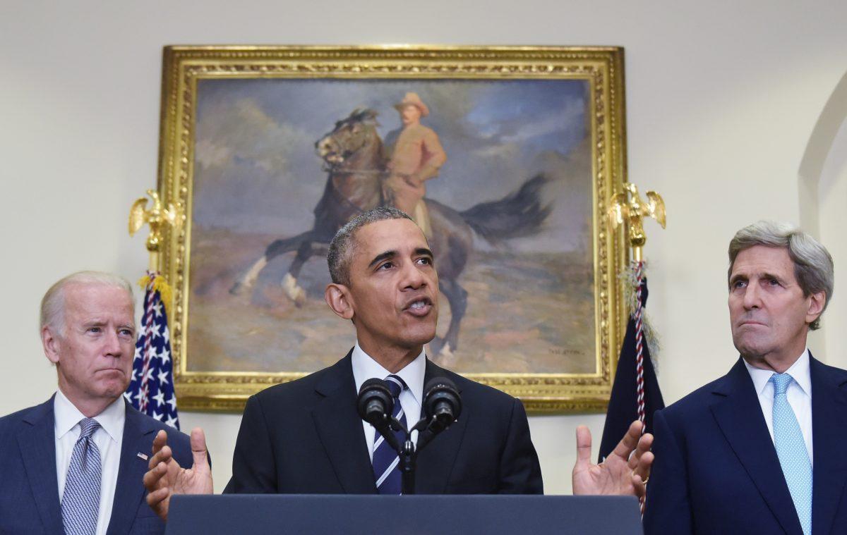 Then-President Barack Obama announces the denial of the Keystone XL pipeline, flanked by Secretary of State John Kerry (R), and Vice President Joe Biden, in the Roosevelt Room of the White House in Washington on Nov. 6, 2015. (MANDEL NGAN/AFP/Getty Images)