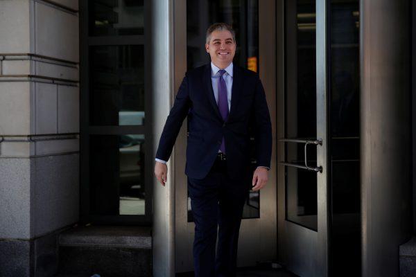 Cable News Network (CNN) Chief White House correspondent Jim Acosta smiles as he departs after a judge temporarily restored Acosta's White House press credentials following a hearing at a District Court in Washington, on Nov. 16, 2018. (Carlos Barria/Reuters)
