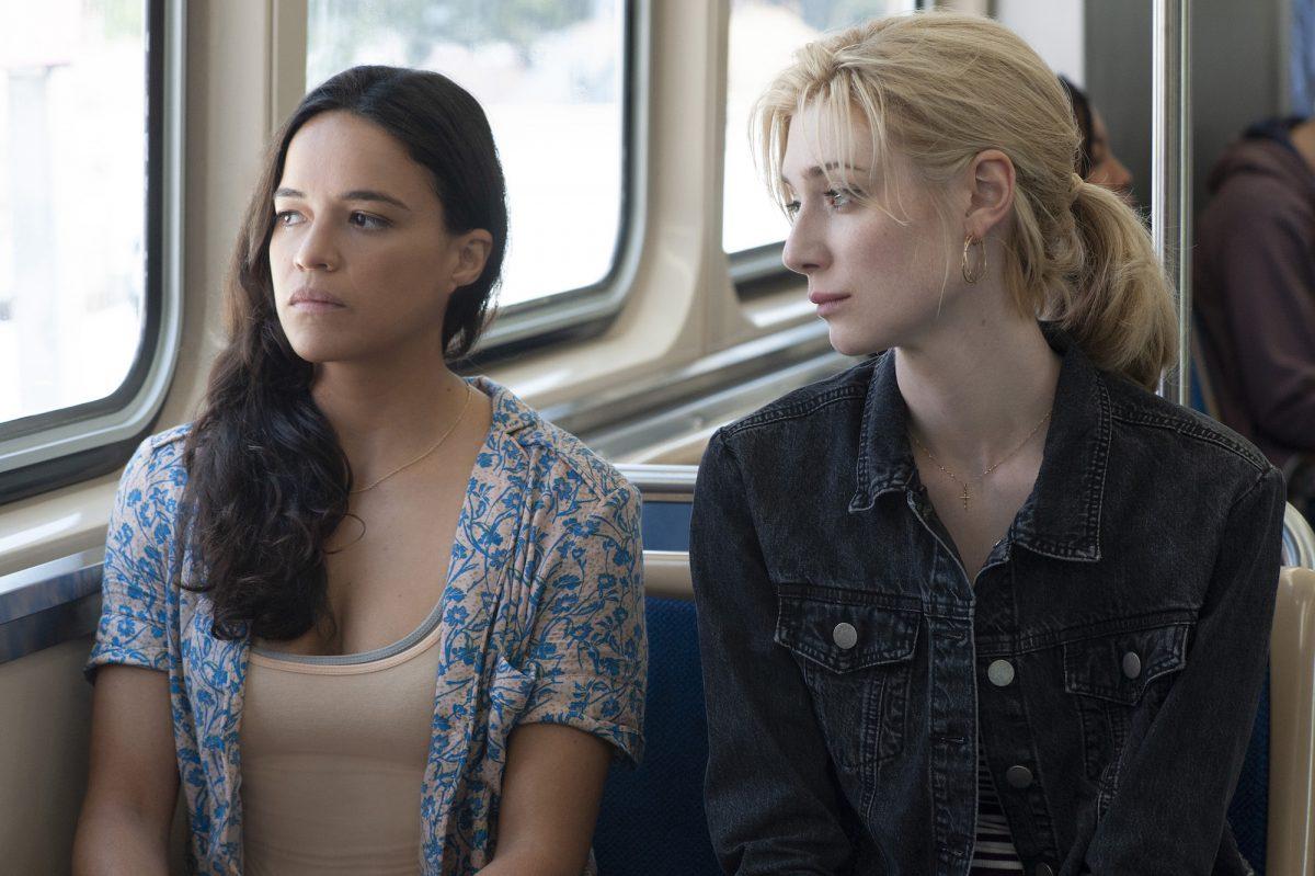 Michelle Rodriguez (L) and Elizabeth Debicki star in Twentieth Century Fox’s “Widows.” (Suzanne Tenner/Twentieth Century Fox Film Corporation)