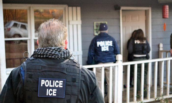 Immigration and Customs Enforcement agents seek to arrest immigration fugitives, reentrants, and at-large criminal aliens during an operation in Atlanta, Ga., on Feb. 9, 2017. (Bryan Cox/U.S. Immigration and Customs Enforcement via Getty Images)
