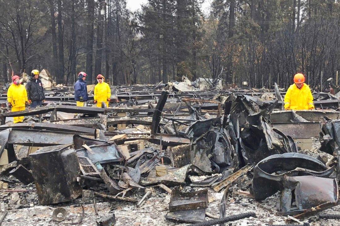 Rain Helps Douse California Fire but Slows Search Crews