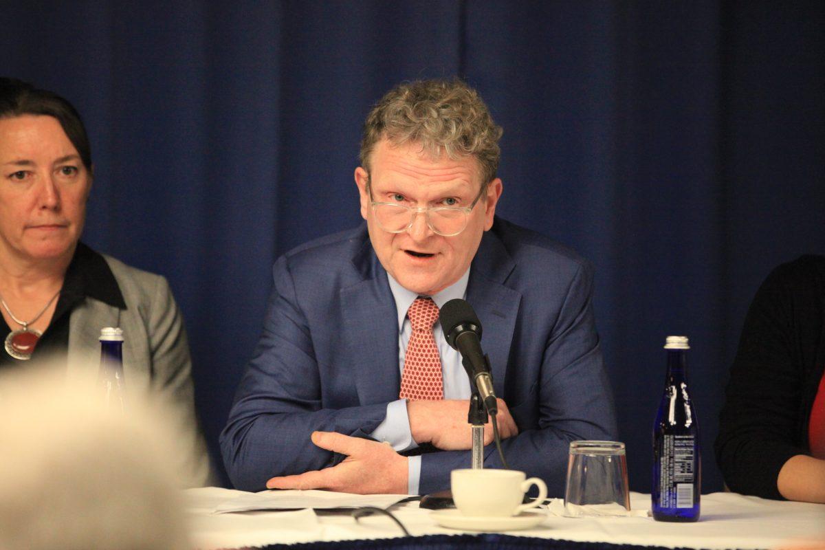 Sean Roberts, director of international development studies at the George Washington University, speaks on behalf of a coalition of scholars opposing the repression of Uyghurs in China at the National Press Club in Washington on Nov. 26, 2018. (Jennifer Zeng/The Epoch Times)