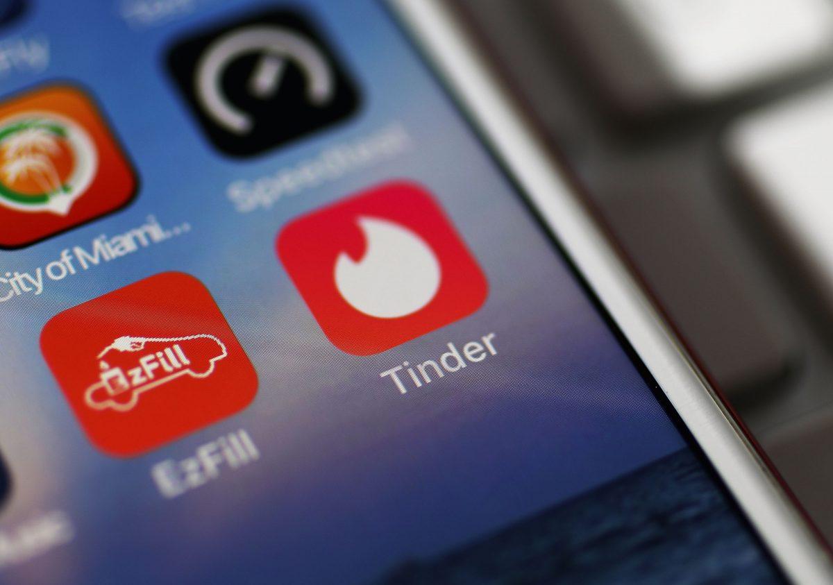 The icon for the dating app Tinder is seen on the screen of an iPhone in Miami, Florida, on Aug. 14, 2018. (Joe Raedle/Getty Images)