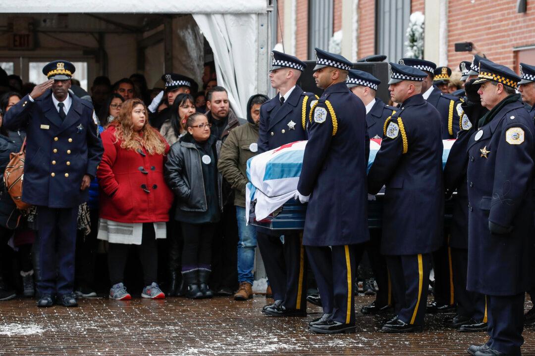 Memorial Billboard for Chicago Officer Killed in Hospital Shooting Is Vandalized