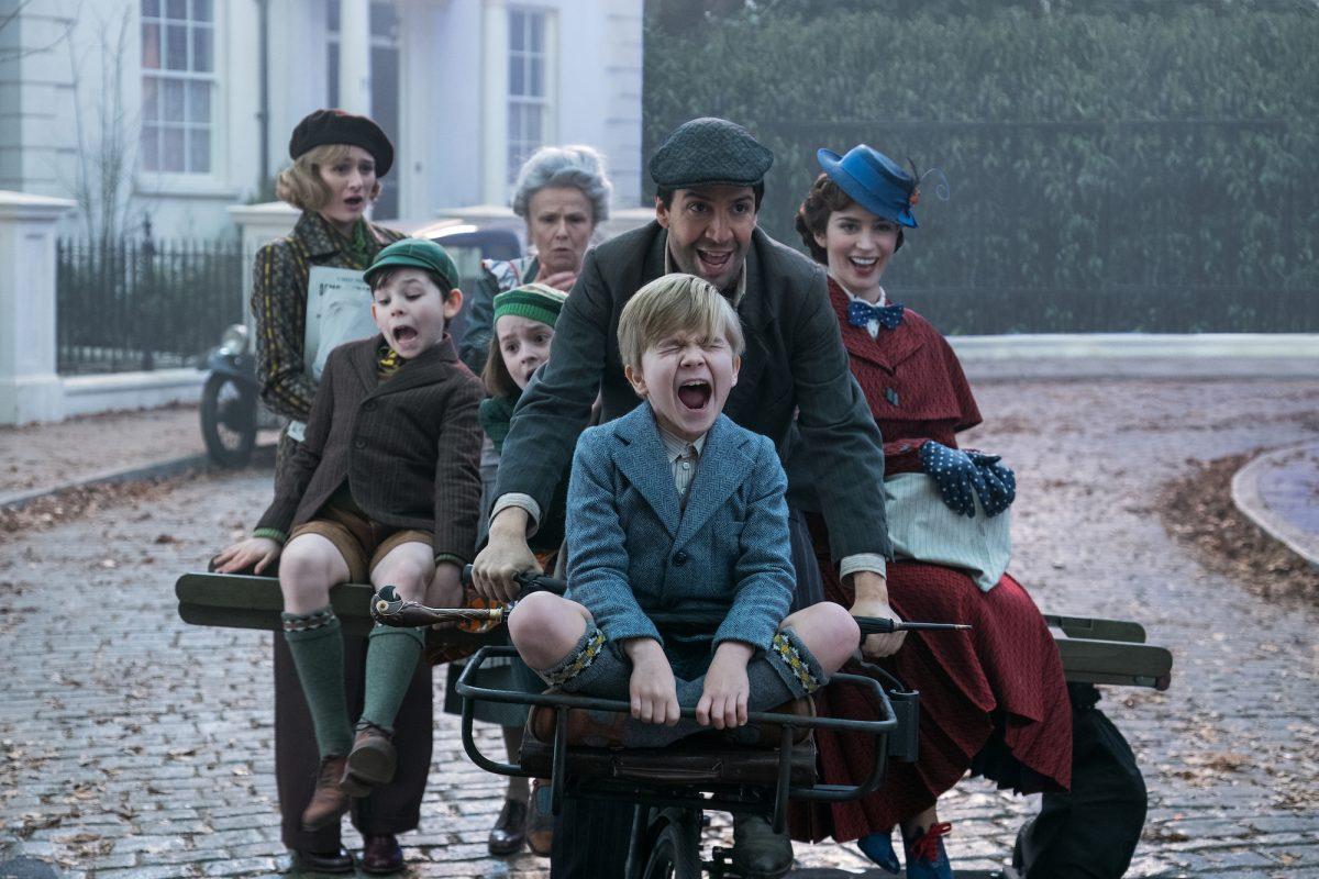 (L–R) Jane (Emily Mortimer), John (Nathanael Saleh), Annabel (Pixie Davies), Ellen (Julie Walters), Jack (Lin-Manuel Miranda), Georgie (Joel Dawson), and Mary Poppins (Emily Blunt) in Disney's new musical, which only has a smidgen of the original's magic. (Disney)