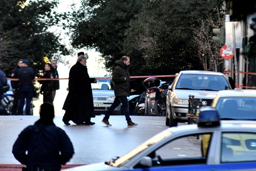 Explosive Device Detonates Outside Athens Church, Injuring Two People