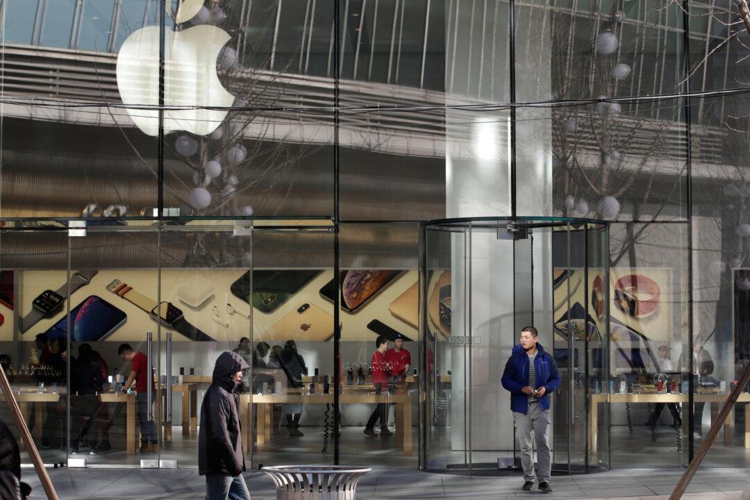 Paying the Price: Stung by Slowdown, China Shoppers Take Bite Out of Apple