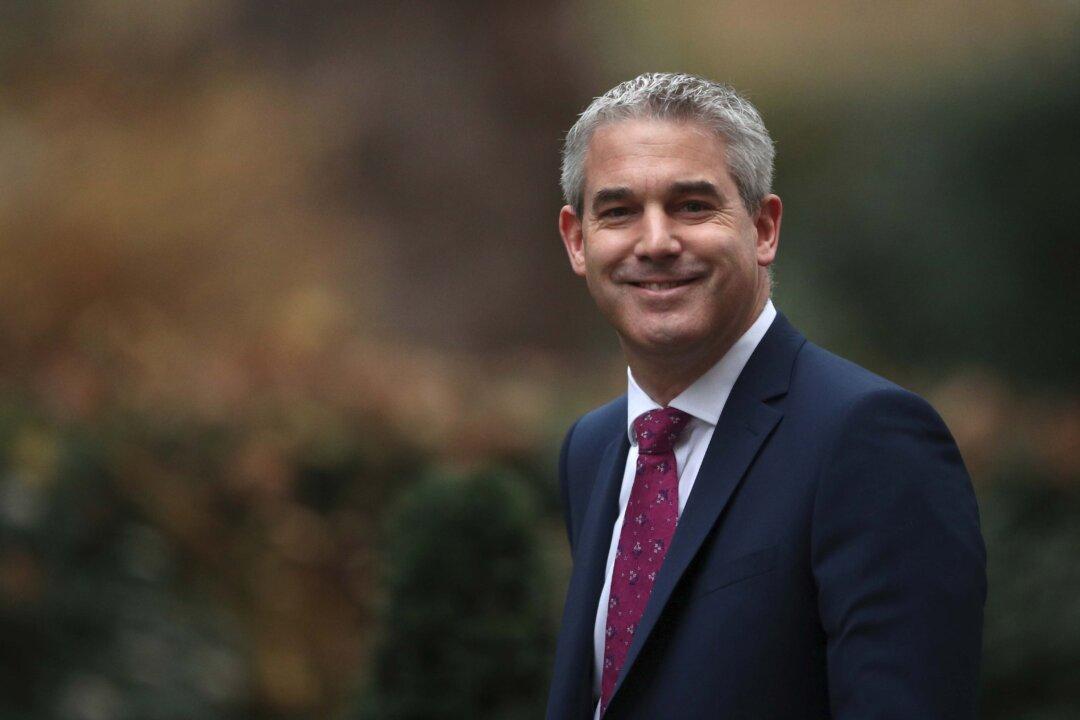 British Lawmakers Warn Against ‘No-Deal’ Brexit as May’s Plan Hangs in Balance