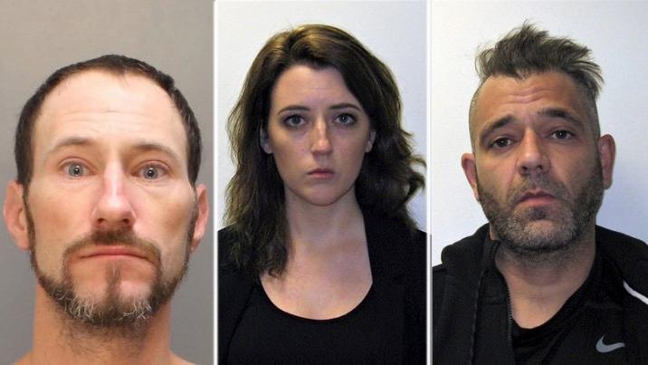 Homeless veteran Johnny Bobbitt, left, and couple Kate McClure and Mark D’Amico are facing criminal charges of conspiracy and theft by deception in connection with an allegedly fraudulent charity campaign. (Burlington County Prosecutor's Office)