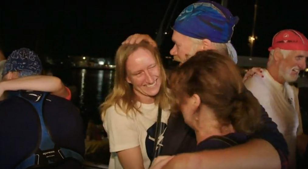 Team member Erik Koning kissing girlfriend Marian. (Screenshot/Reuters)
