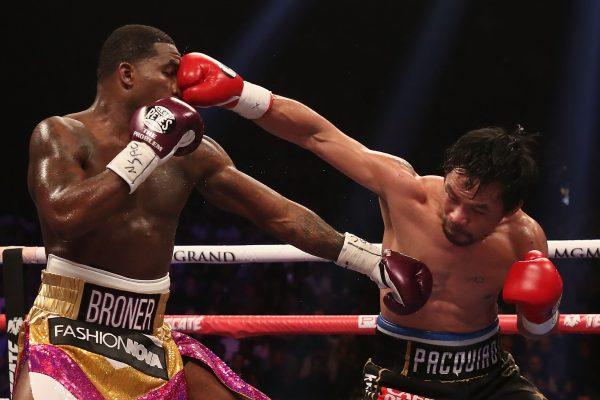 Manny Pacquiao (R) throws a right on Adrien Broner during the WBA welterweight championship at MGM Grand Garden Arena in Las Vegas on Jan. 19, 2019. (Christian Petersen/Getty Images)