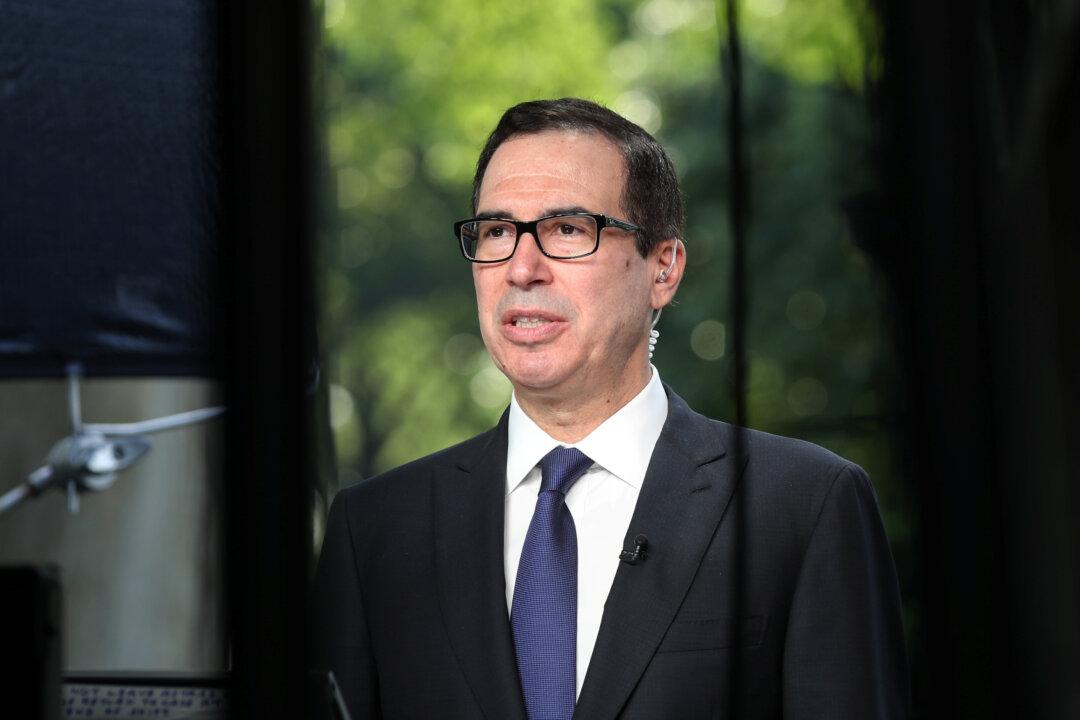 Mnuchin Says Huawei Case ‘Separate’ From US-China Trade Talks