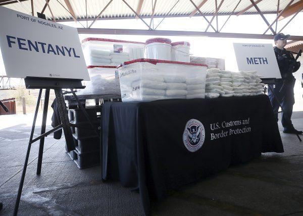A display of fentanyl and meth seized by U.S. CBP officers at the Nogales Port of Entry is shown during a press conference in Nogales, Arizona, U.S. on Jan. 31, 2019. (Mamta Popat/Arizona Daily Star via AP)