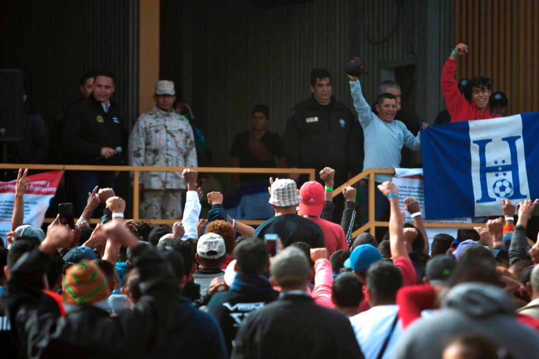 Migrant Caravan Detained in Old Factory, Across From Texas