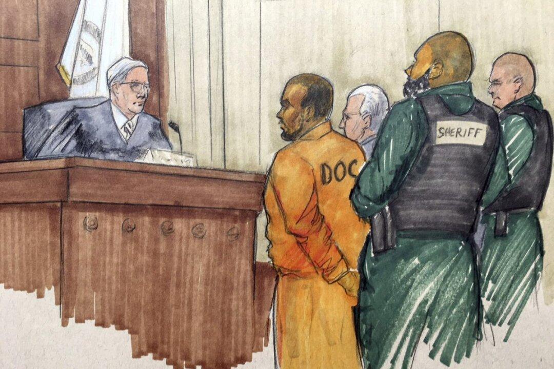 The Latest: Kelly Accuser Says Singer Is the Only One Lying