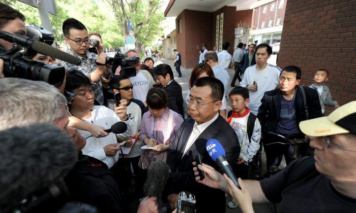 Foreign journalists interview Chinese rights lawyer Jiang Tianyong in Beijing on May 2, 2012. (Mark Ralston/AFP/Getty Images)