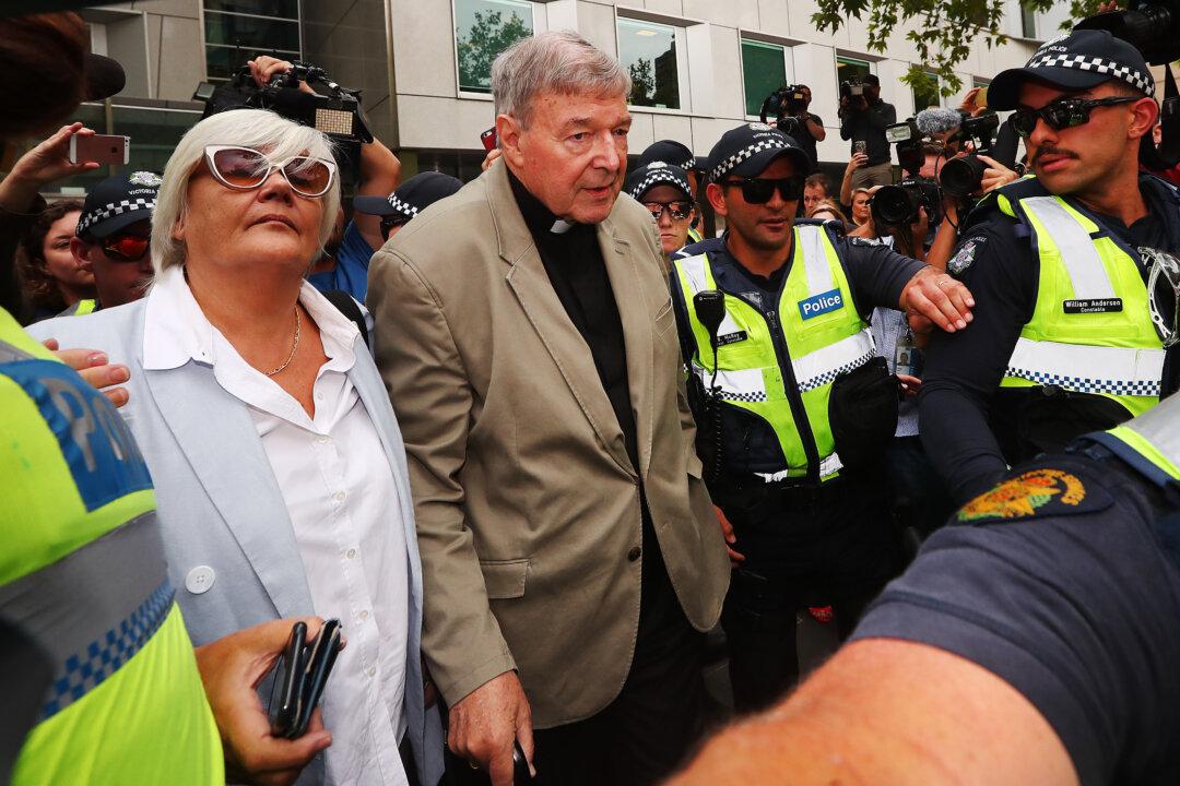 Australian Media Face Trial Over Pell Sex Abuse Case Reporting