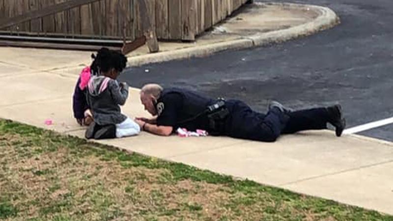 Cop Plays Games with Frightened Children on Sidewalk After False Gas Leak Alarm