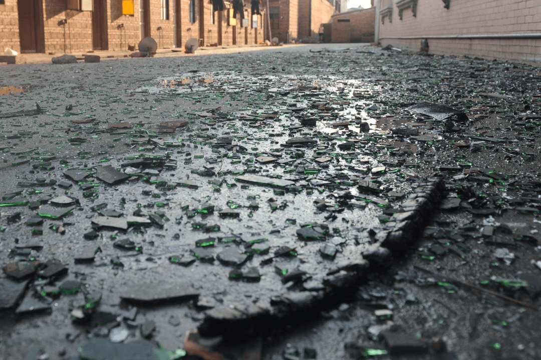 Man Crashes Through Glass Door at Government Ceremony in China’s Sichuan Province