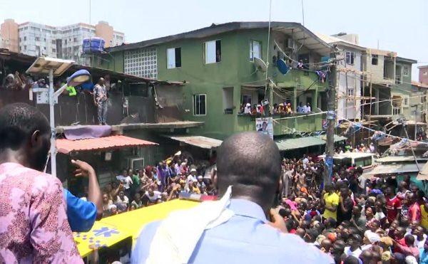 In this image taken from video rescue workers and emergency teams work at the scene of a building collapse in Lagos, Nigeria, on March 13, 2019. (AP Photo)