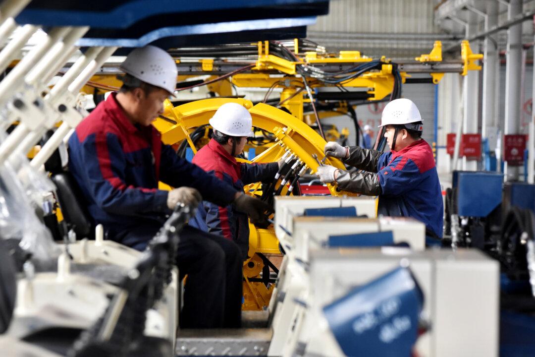 China Industrial Output Growth Falls to 17-Year Low