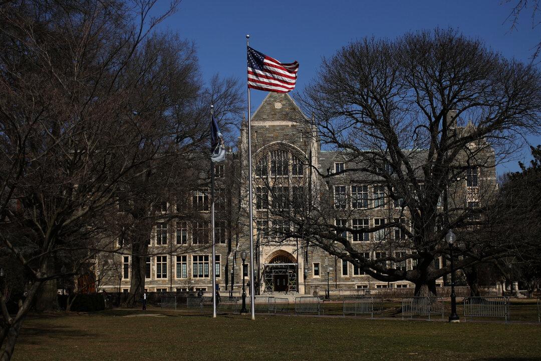 Accused Test Taker in College Scandal Plans to Plead Guilty