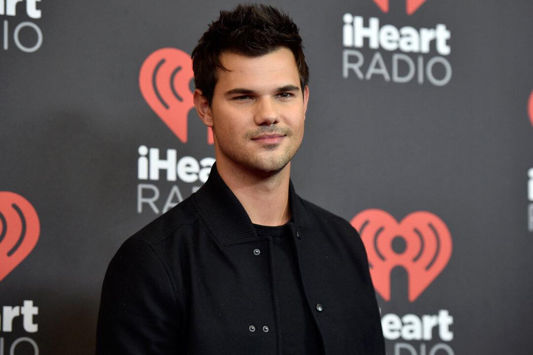Twilight Star Taylor Lautner Helps Girl Scout with Cerebral Palsy Meet Her Cookie Goal