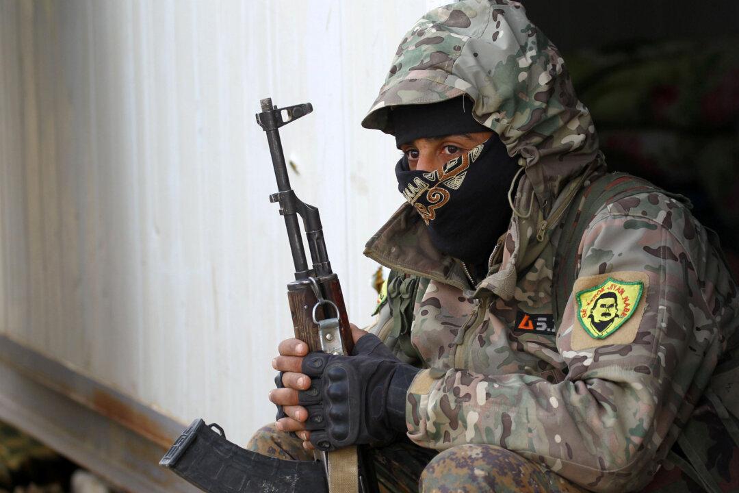 Battle Rages for Last ISIS Syria Enclave