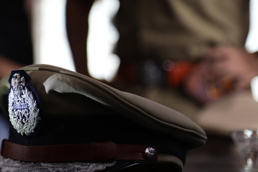 Newly Sworn-In Cop Bows to His Single Mother in a Loving Display of Gratitude