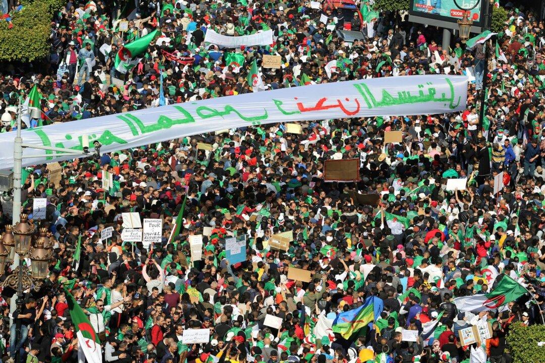 Hundreds of Thousands March Against Algeria’s Bouteflika