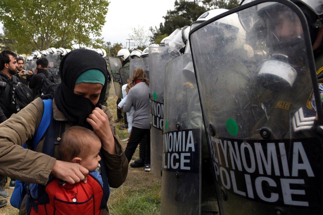 Greek Police Fire Tear Gas at Migrants as Border Convoy Grows