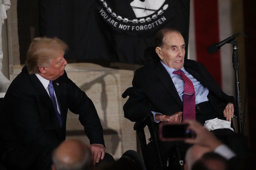 Trump Signs Bill Promoting Bob Dole’s Rank to Colonel