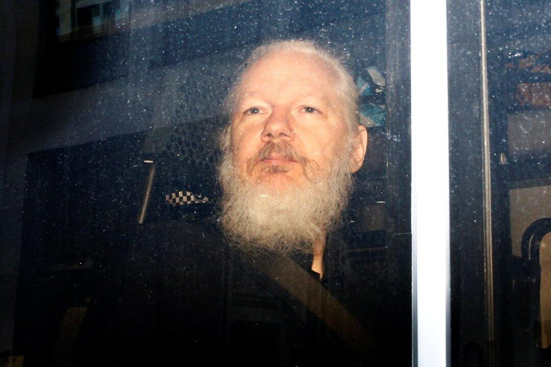 Did Julian Assange Get Kicked Out From Embassy Because of a Leaked Photo?
