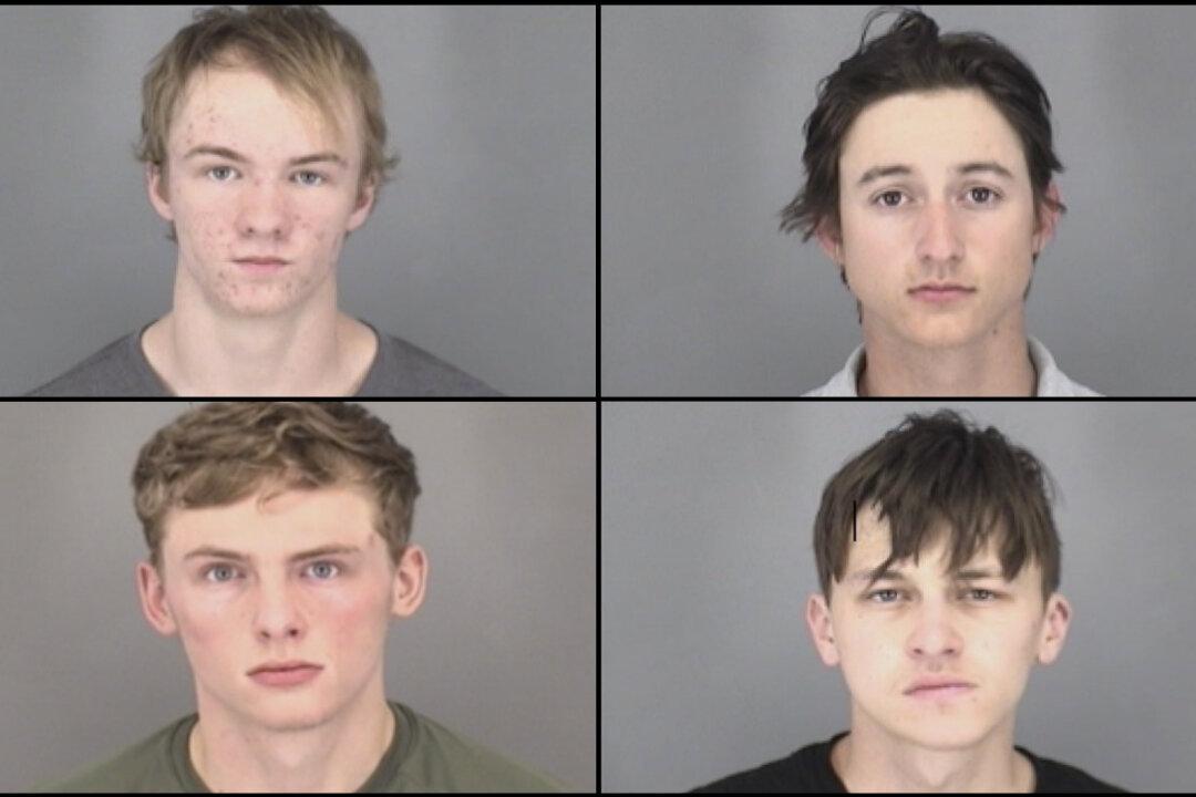 5 People Arrested in Connection With Chemical Bomb Thrown at Officer, Resident