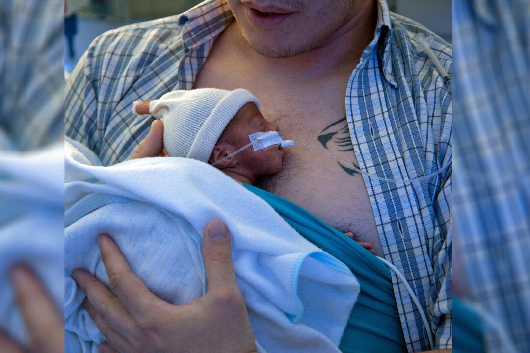 Mom Catches Exhausted Hubby Cuddling a Robe Instead of Newborn Son